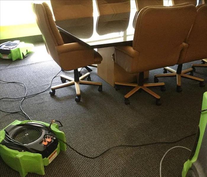 Conference room with SERVPRO of Victoria drying equipment 