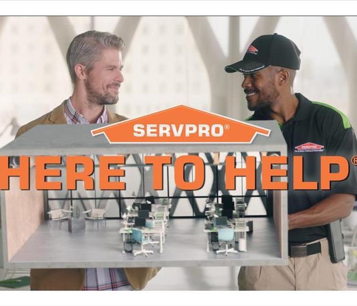 SERVPRO employee working with customer